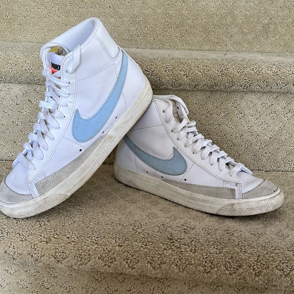 Nike Hi-Tops. W size 6. White leather with baby blue swoosh. Minor wear